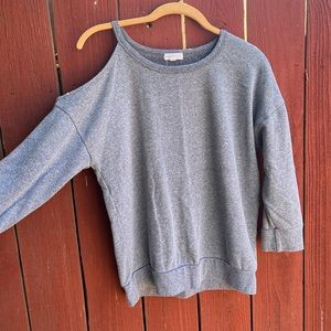 gray “off shoulder” sweater